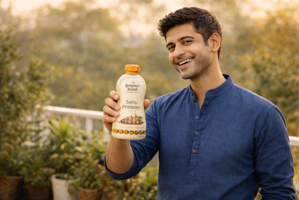 Happy person enjoying sattu drink outdoors with natural Indian backdrop